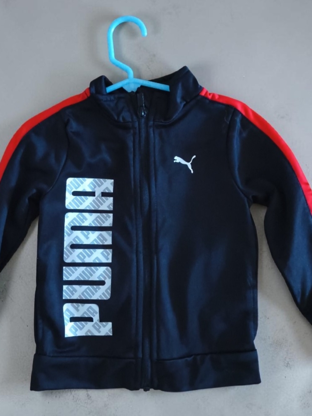 Puma Black Jacket with Red Shoulder Stripes and White Logo